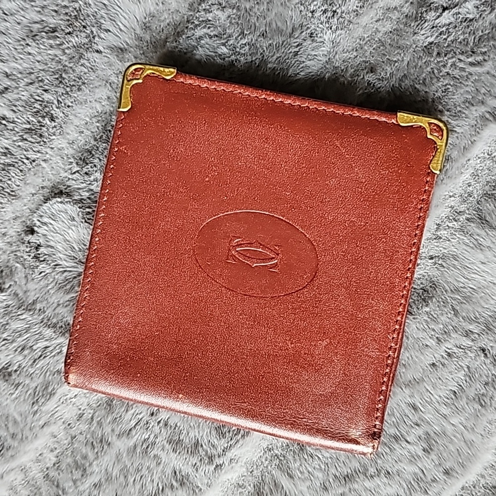 vintage Cartier bordeaux bifold wallet